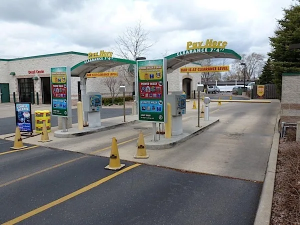 Fast Jacks pay stations showing the Power Wash & Wax menu